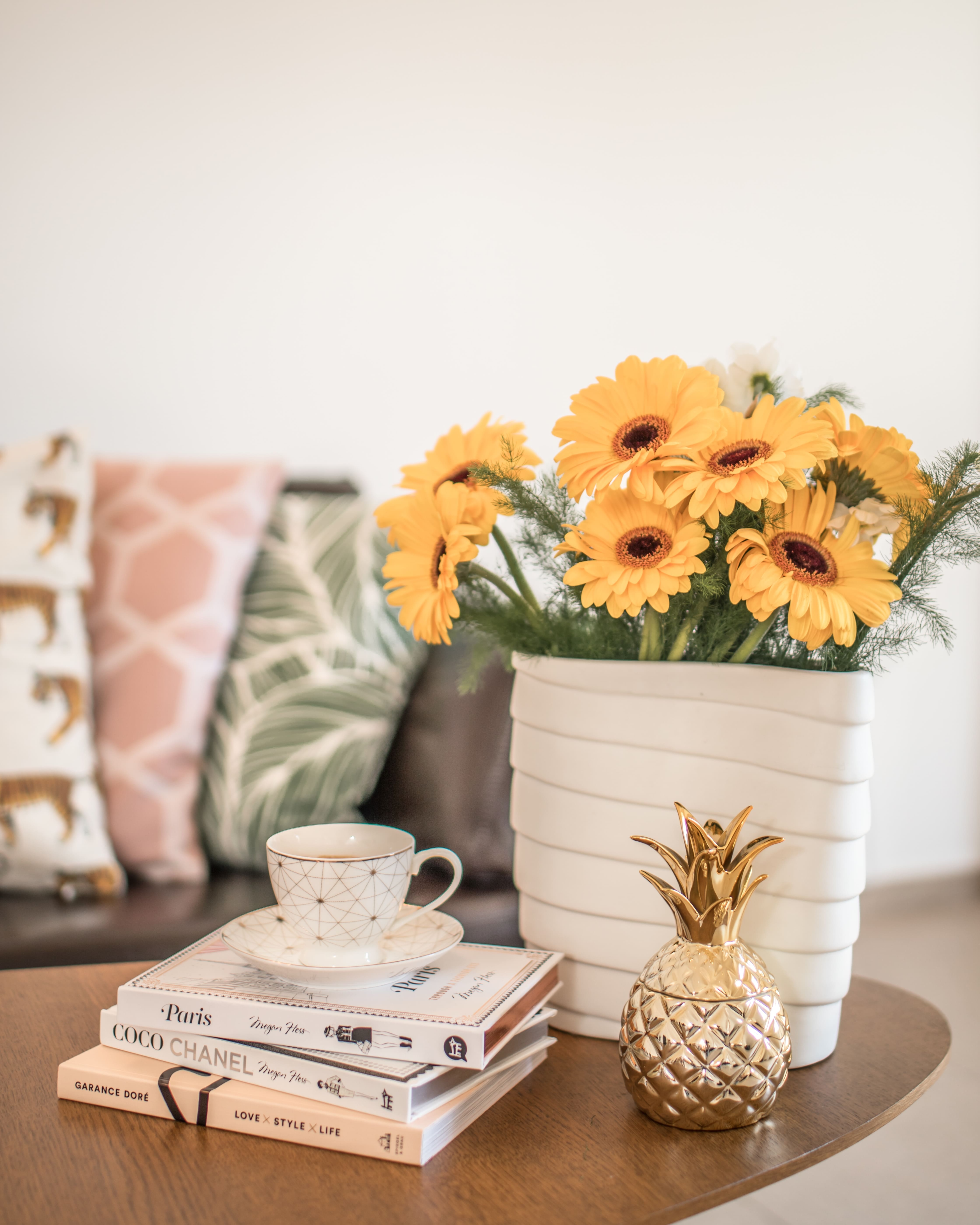 yellow flowers on a coffee table