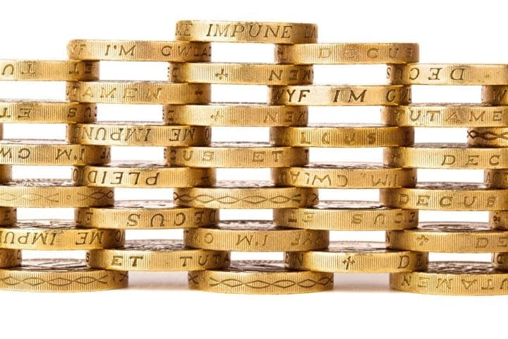 British pound coins stacked together