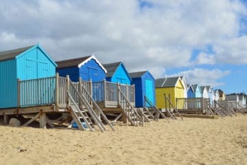 Blue and yellow beach huts